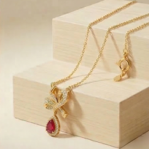 925 Sterling Silver Ribbon Bow Pendant Necklace Jewellery with Red Stone in Gold Plated Finish